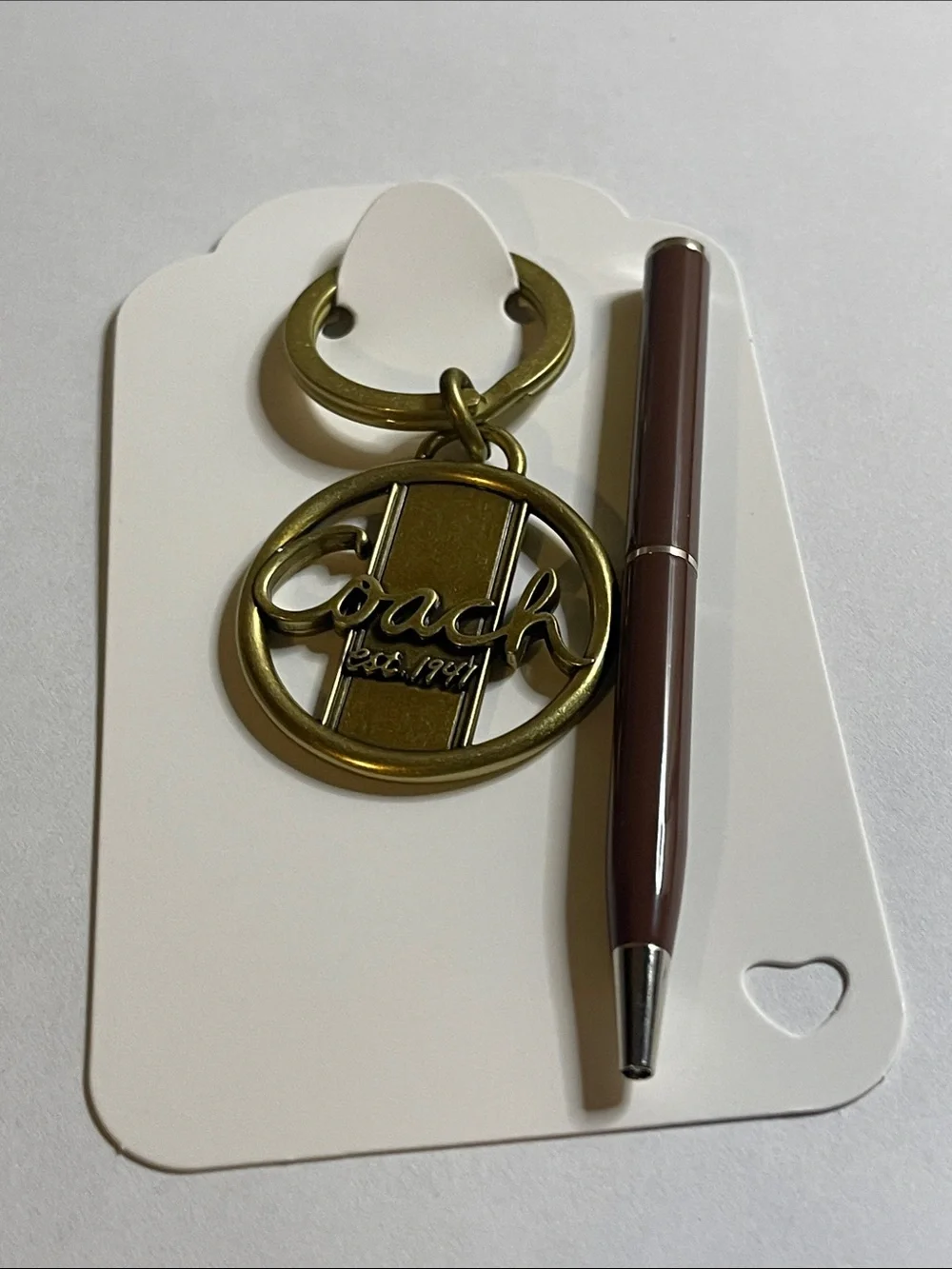 Coach Gold-Tone Circular Logo Keyring and Coach Pen